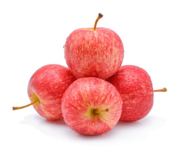 gala apples with drops of water on white background.